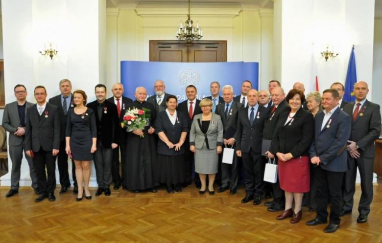 Starości z odznakami honorowymi